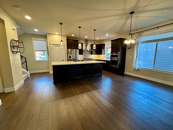 Beautiful Kitchen with massive 4 seating island and Dining area