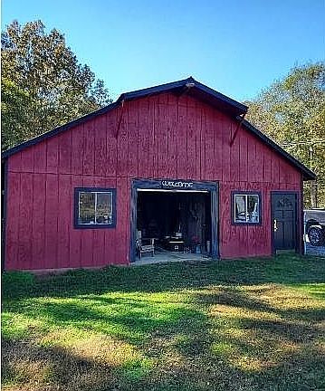 Front of barn, roll-up door