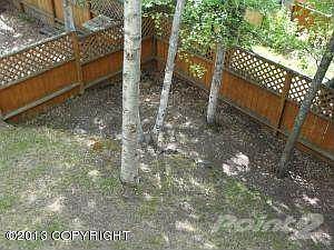 Looking down off deck to back yard