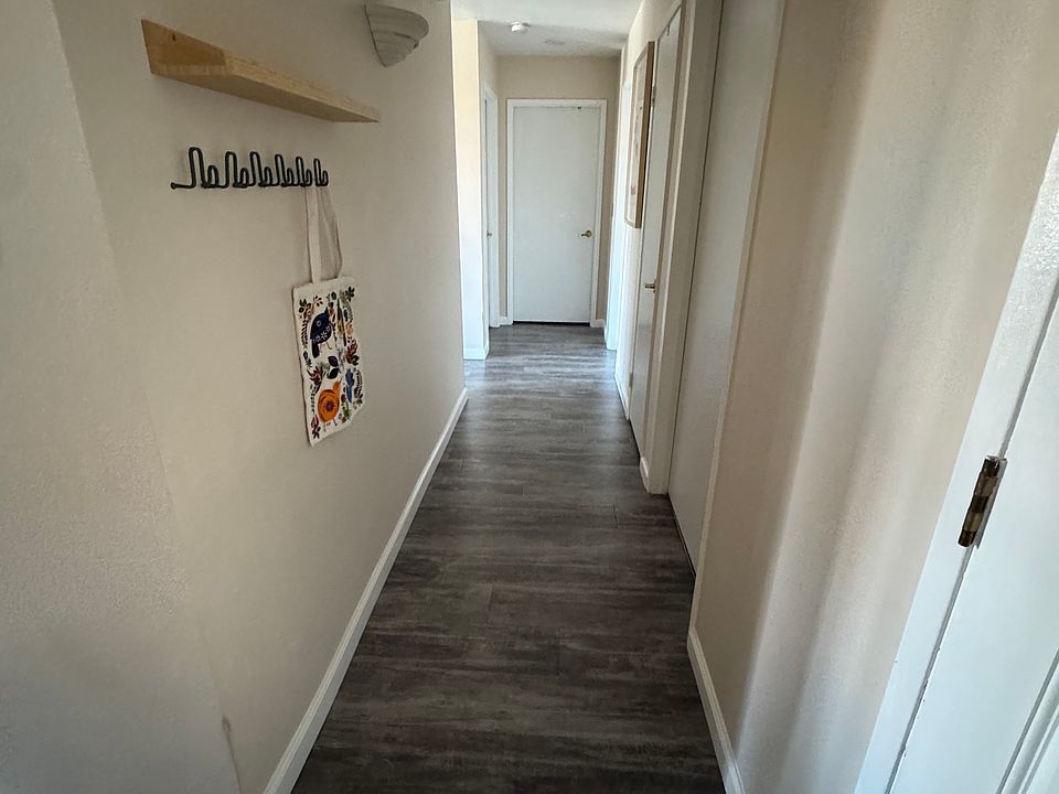 Immediately looking right upon entering front door.