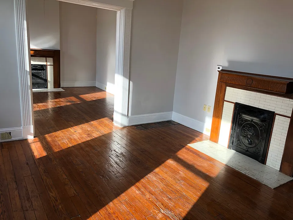 View of the front living room and the back den/dining room.