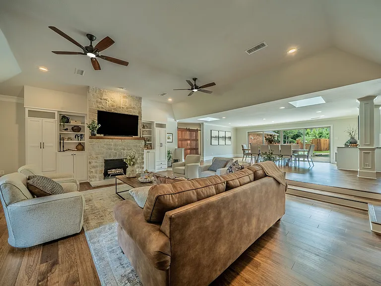 Cozy up by the stone fireplace for a movie night.