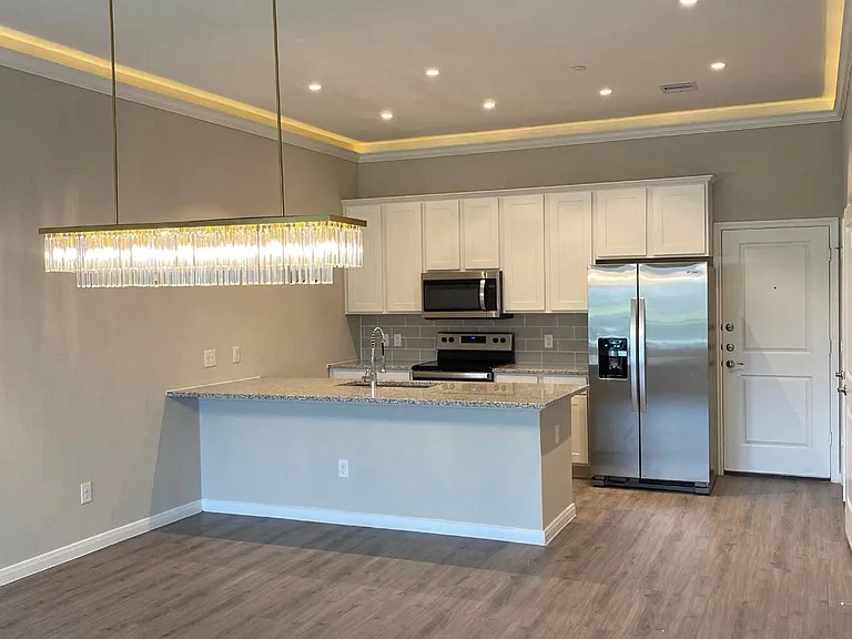 Dining Room with Peninsula and Chandelier (Phase I Plan 4192-S)
