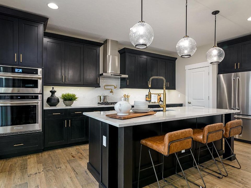 Representative Photo - Generous kitchen island provides a centerpiece for entertaining