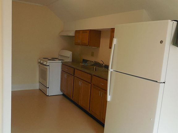New kitchen; large pantry opposite counters; photo taken fro