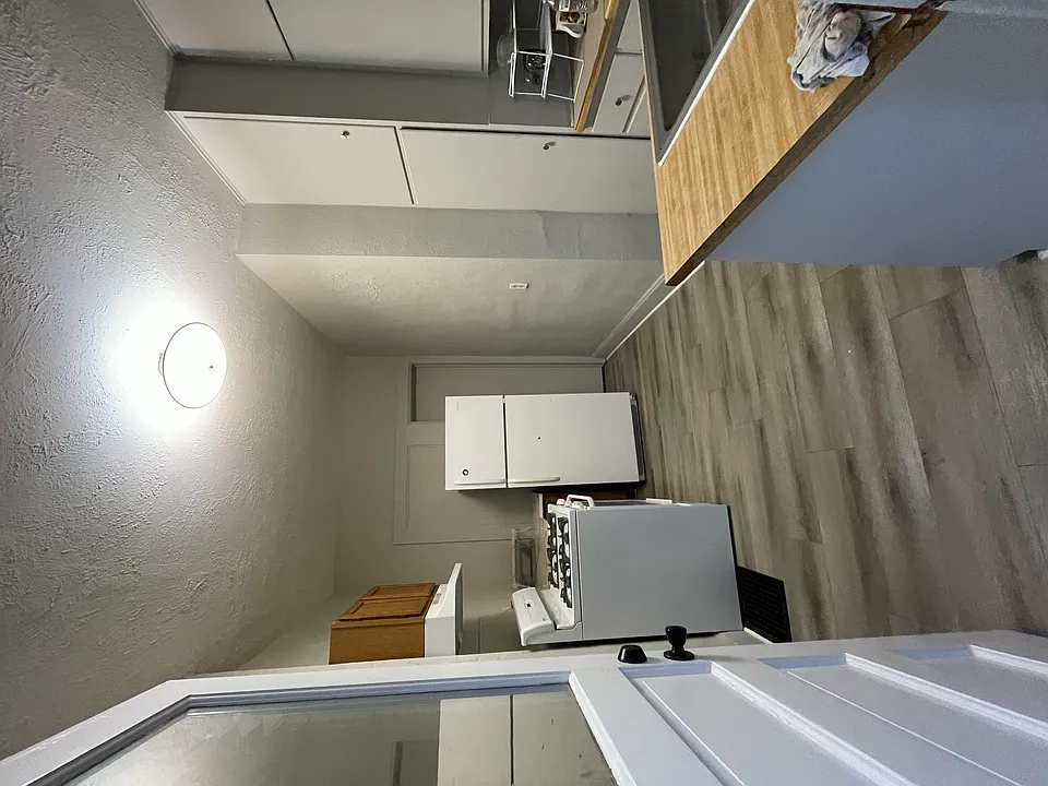 As seen from back entrance to the kitchen..