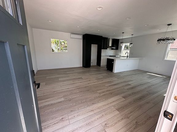 Welcome to an open floorplan kitchen and living room.
