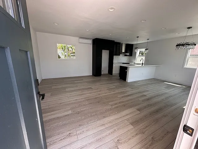 Welcome to an open floorplan kitchen and living room.