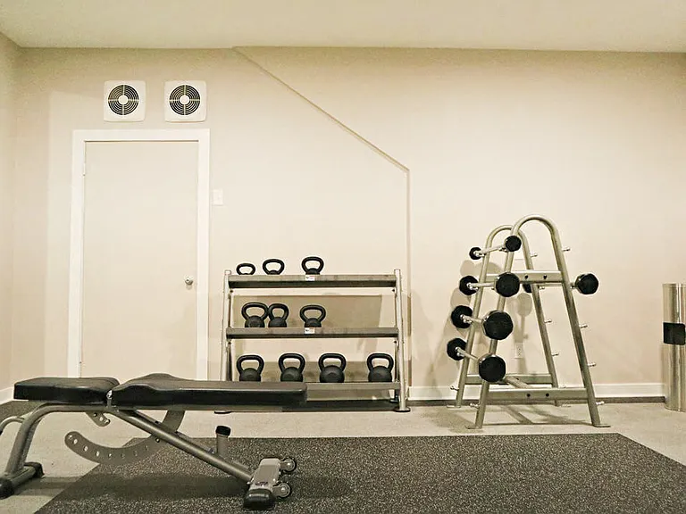 Plenty of Free Weights & Loaded Barbells