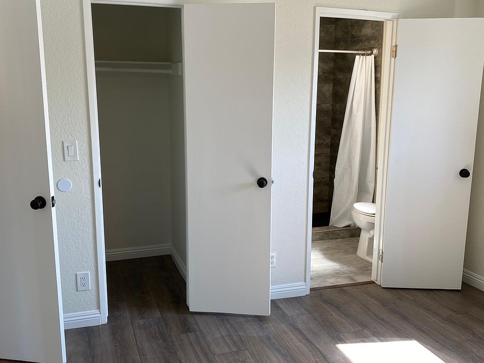 Master Bedroom Walk in closet and all new Bathroom. New floor and fan.