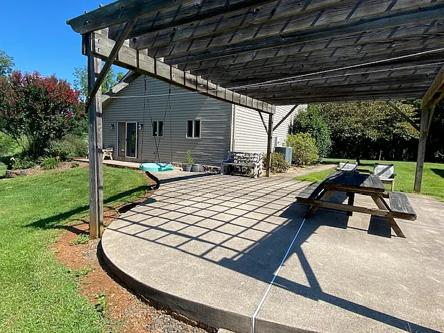 Side of guest house with outside patio