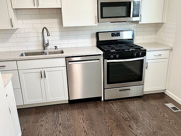 New kitchen with all stainless steel appliances