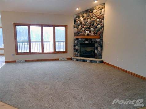 Open Floor Plan - Great Room with Stone Fireplace