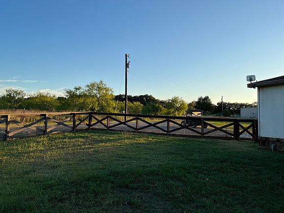 back yard looking at drive