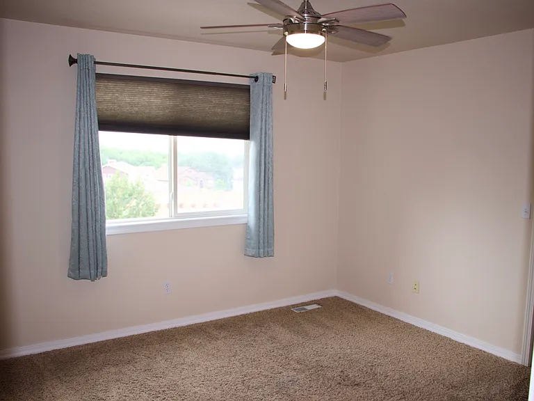 Second bedroom upstairs with attached bathroom