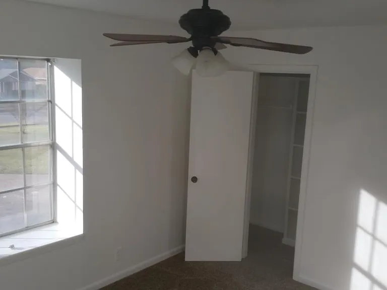 Ceiling fans and bay windows in both bedrooms