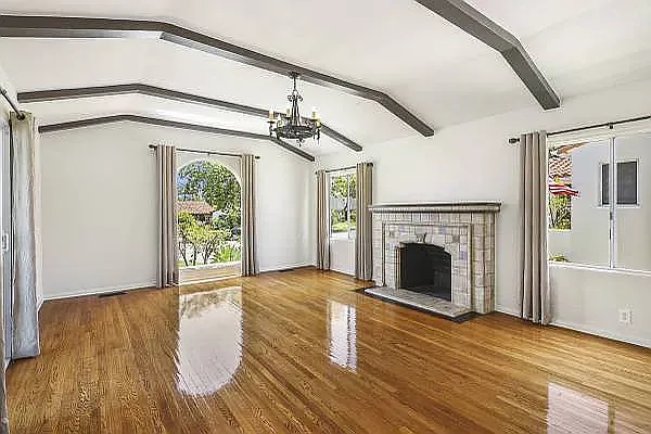 Living Room with beautiful hardwood oak floors, Bachelder tile, slider access to courtyard