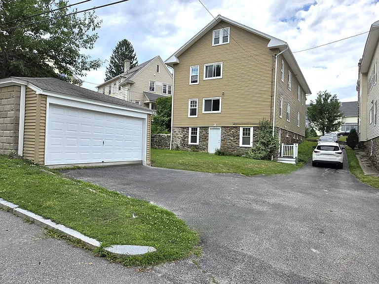 Backyard and parking area.