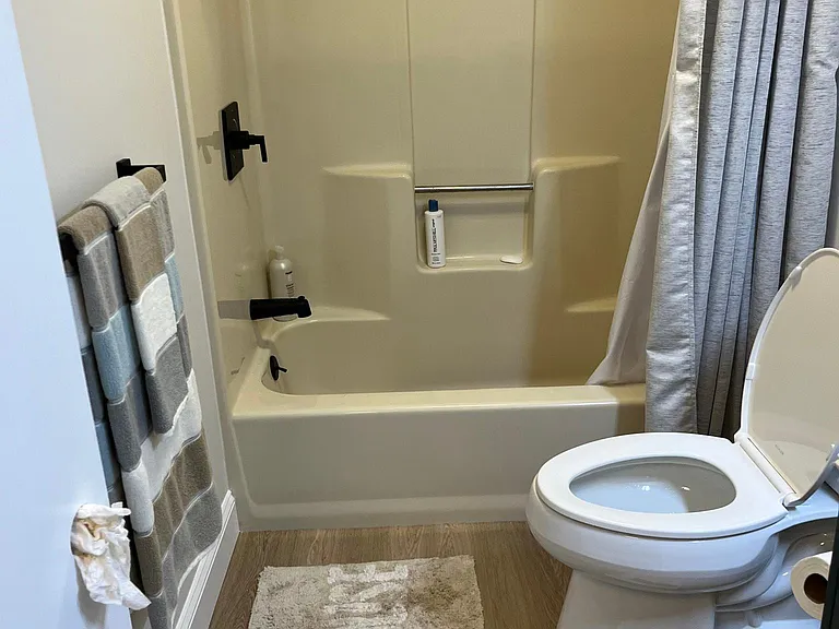 Full bathroom off of twin bedroom.