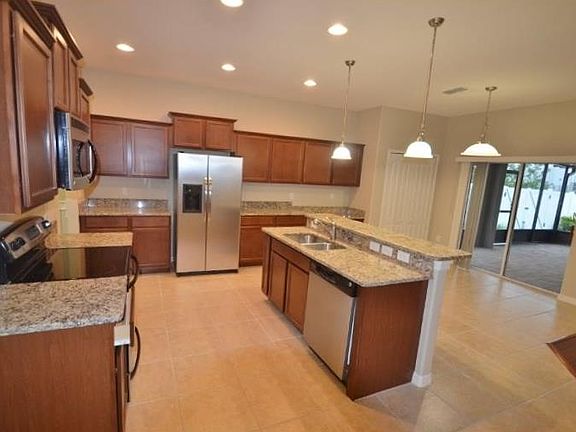 5th image of 12327 Holmwood Greens Pl