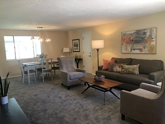 Open and inviting great room leads to oversize 2-car garage.