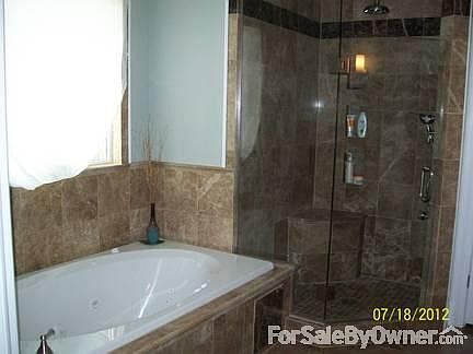 Master Bathroom
						:
						shower, jacuzzi tub, double granite vanity, large linen closet &
marble floors