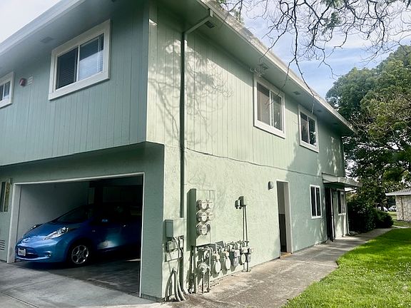 Carport plus additional parking in driveway