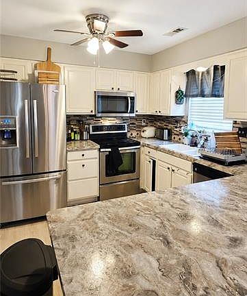 5th image of 6404 Sandgate Dr N