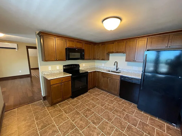 Kitchen looking back to living room