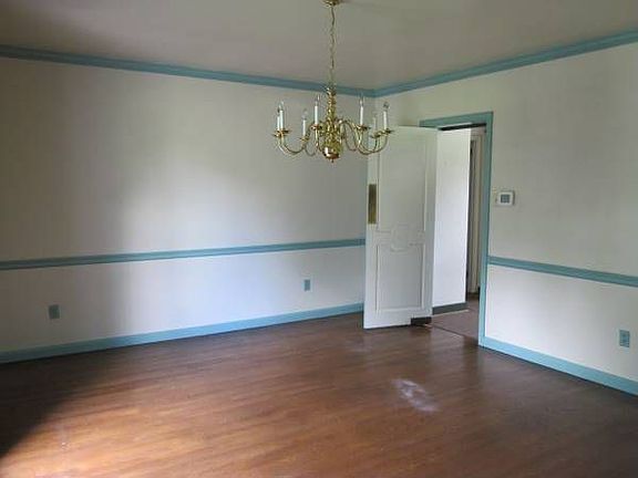 Large, formal dining room off entry