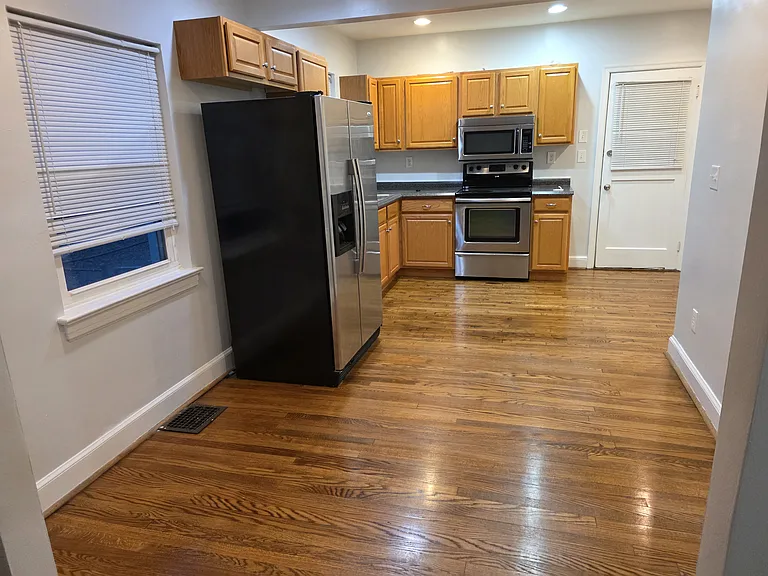 Open dining and kitchen area, plenty of natural light