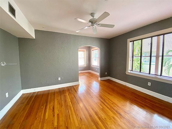 Real hardwood floors and separate living room and dining room