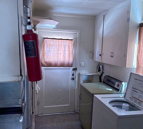 Laundry room with plenty of storage space.