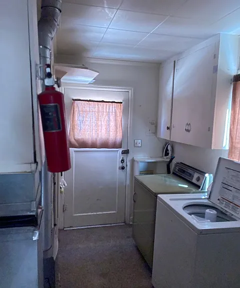 Laundry room with plenty of storage space.