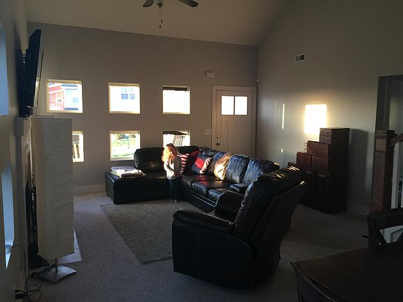 Pic of front door and living room area- but missing showing 