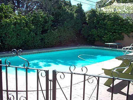 Solar-heated pool