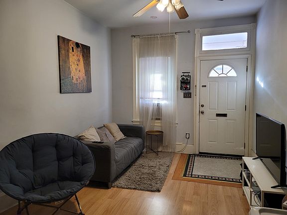 Living room with original tile entry