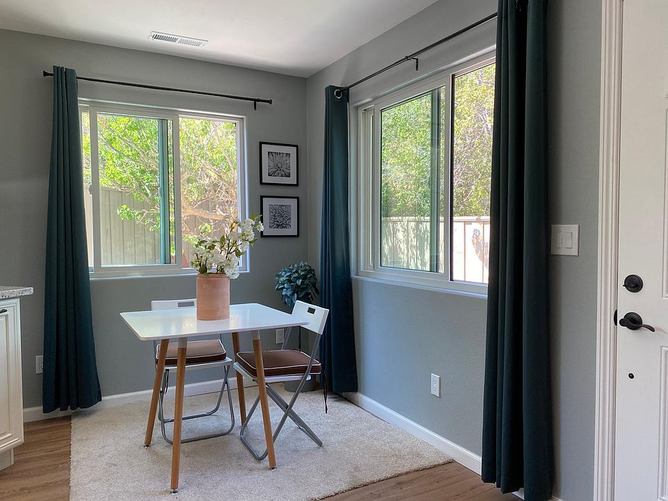 Living/Dining area with private yard view.