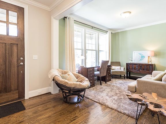 Sun-filled front room, works as an office or an additional living space