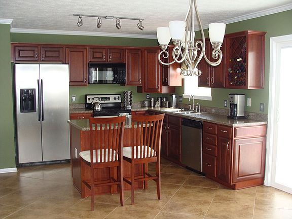 Updated kitchen with stainless steel appliances.