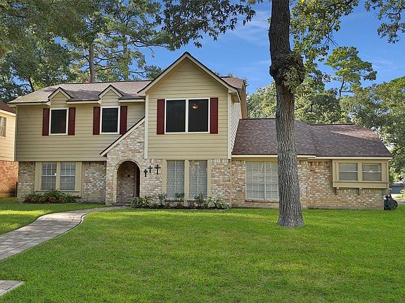 Large corner lot with mature trees.