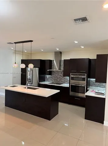 6440 NW 103rd Psge #6440 — Photo 3