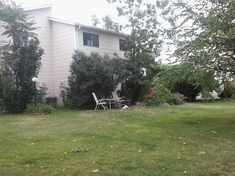 Looking at our patio from across the lawn