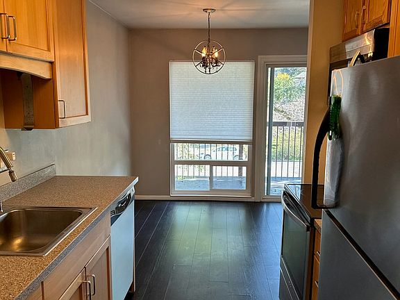 Galley Kitchen with cozy dining area