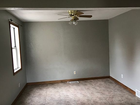 Family room off of the kitchen and dining room. It leads into the deck through sliding doors
