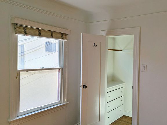 Bedroom with walk-in closet