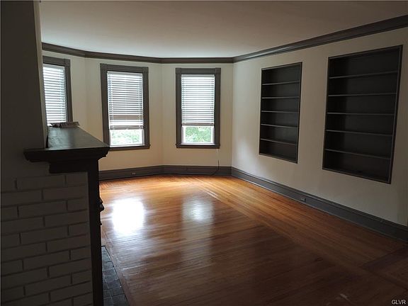 21x15 Main apartment Living Room with fireplace on 2nd floor.