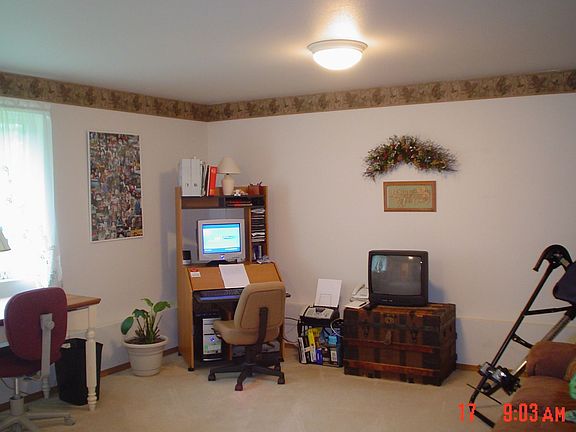 Family room is great for that Big Screen TV or an office with privacy