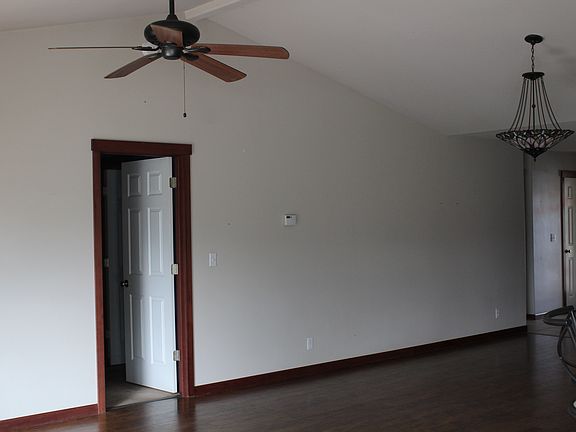 large living room with hardwood floors