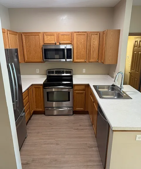 KITCHEN WITH NEWER STAINLESS APPLIANCES